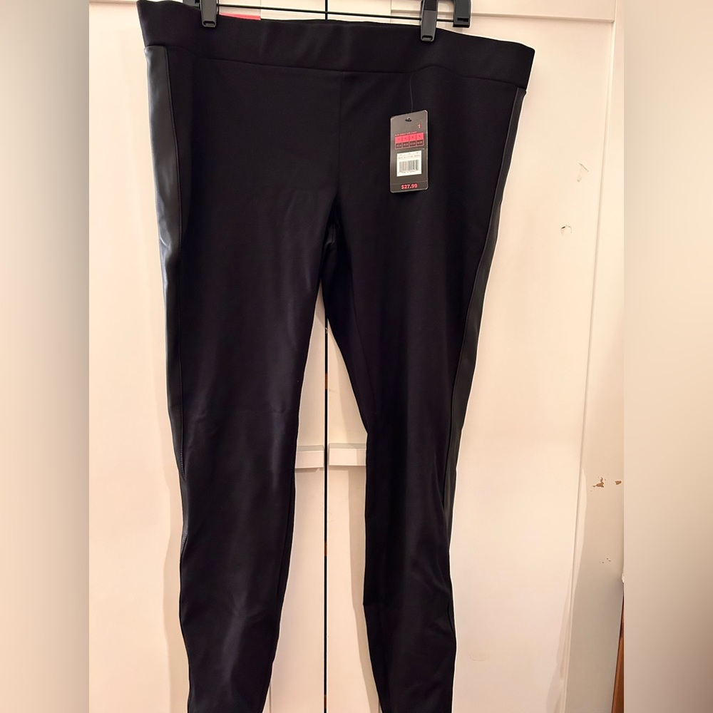 Black on black leggings. Faux leather side stripe 14/16 never worn with tag.